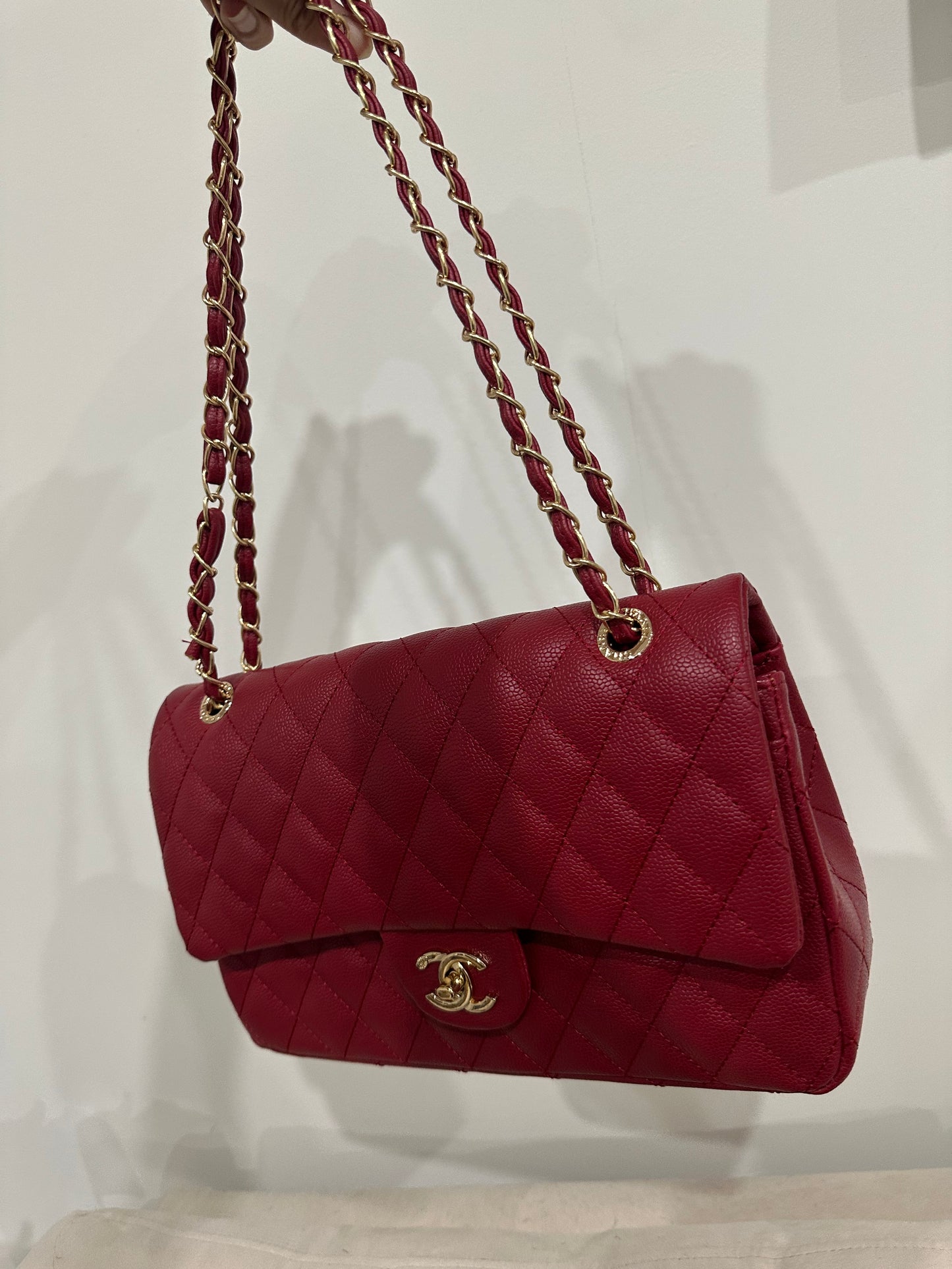 Red quilted cross body bag