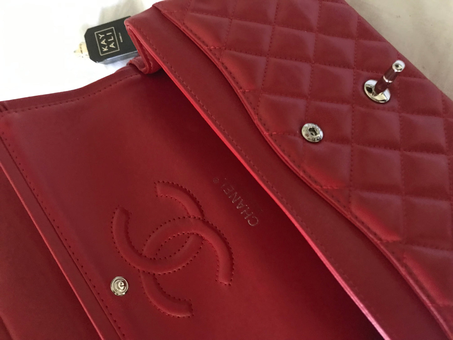 Red quilted cross body bag