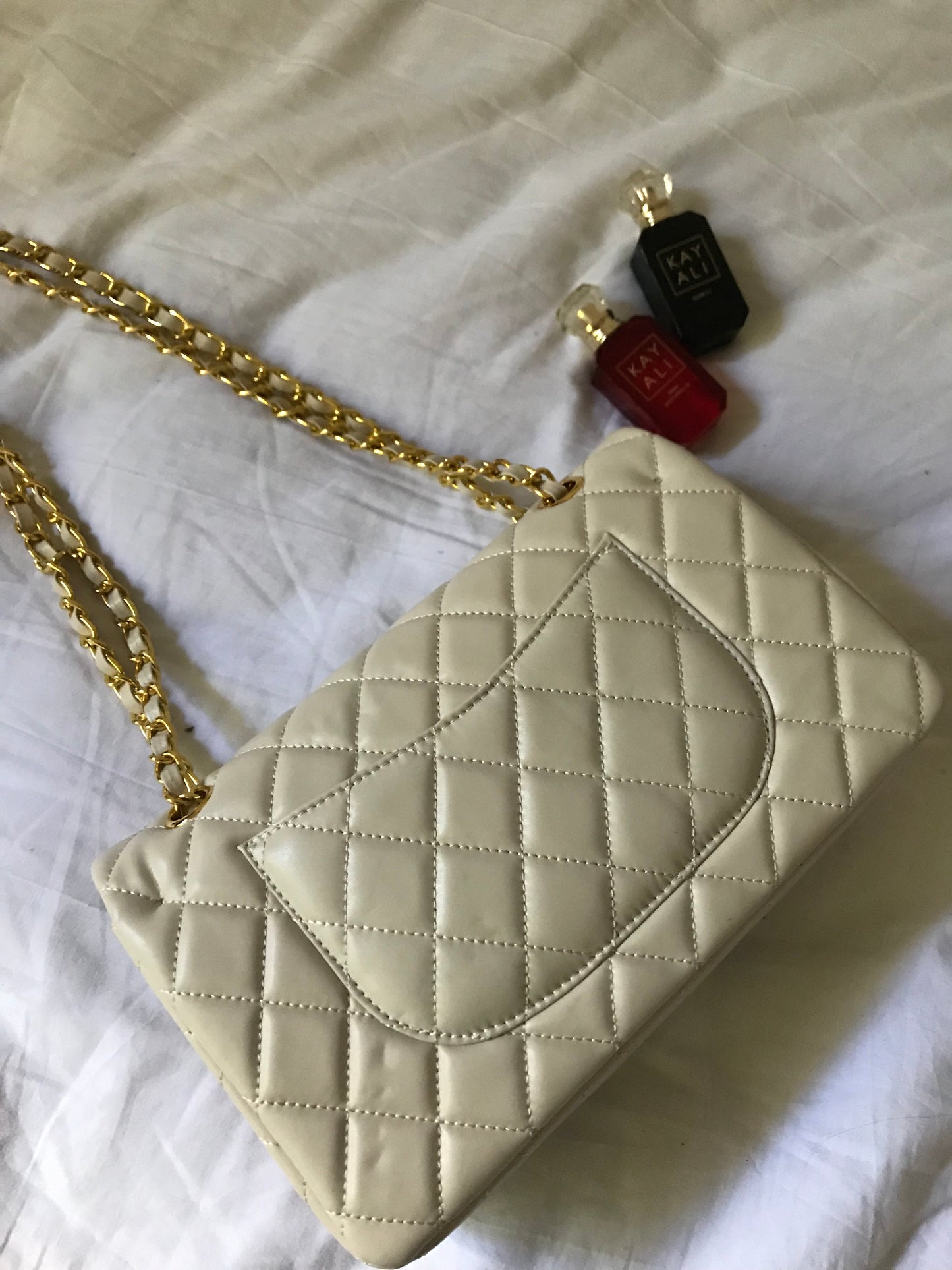 Beige quilted cross body bag