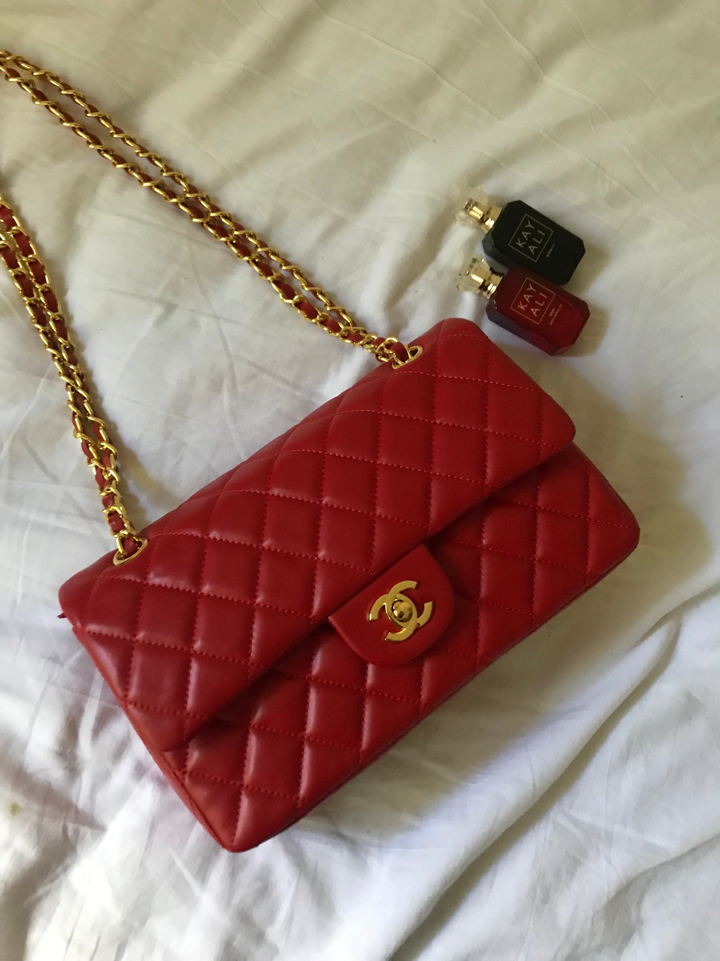 Red quilted cross body bag