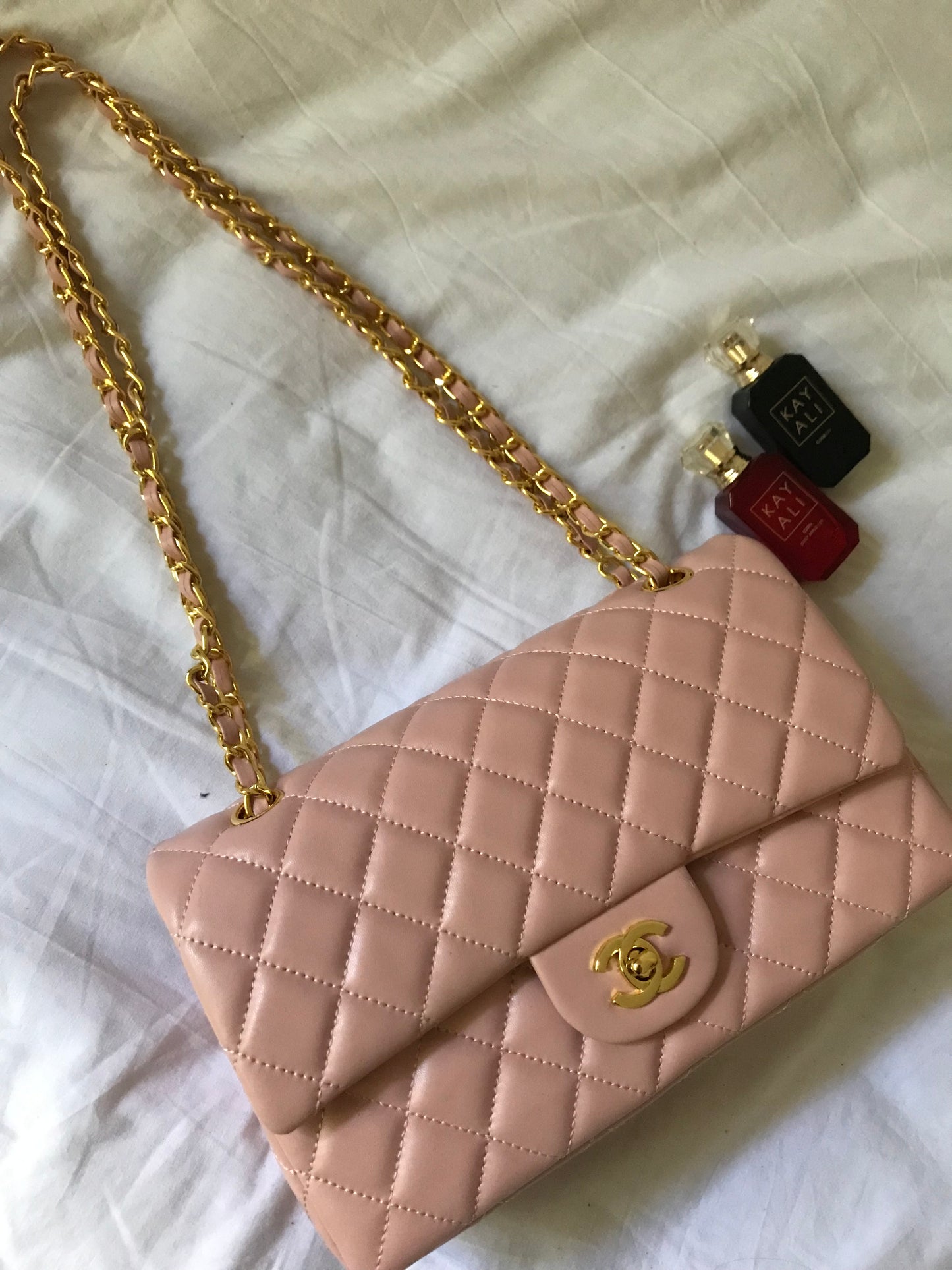 Pink quilted cross body bag