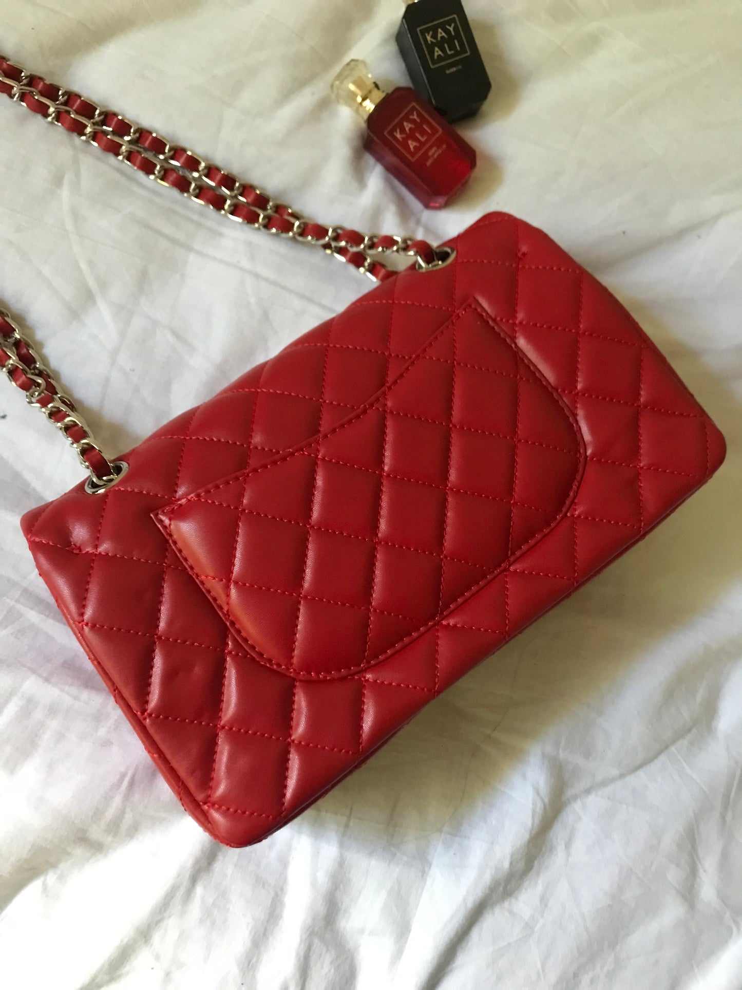 Red quilted cross body bag