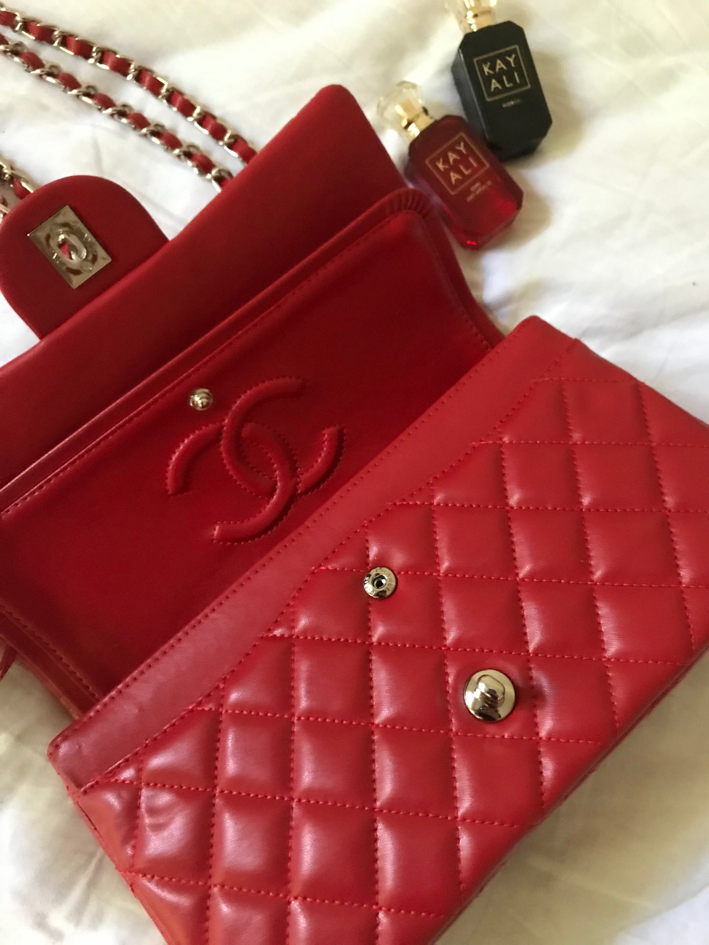 Red quilted cross body bag