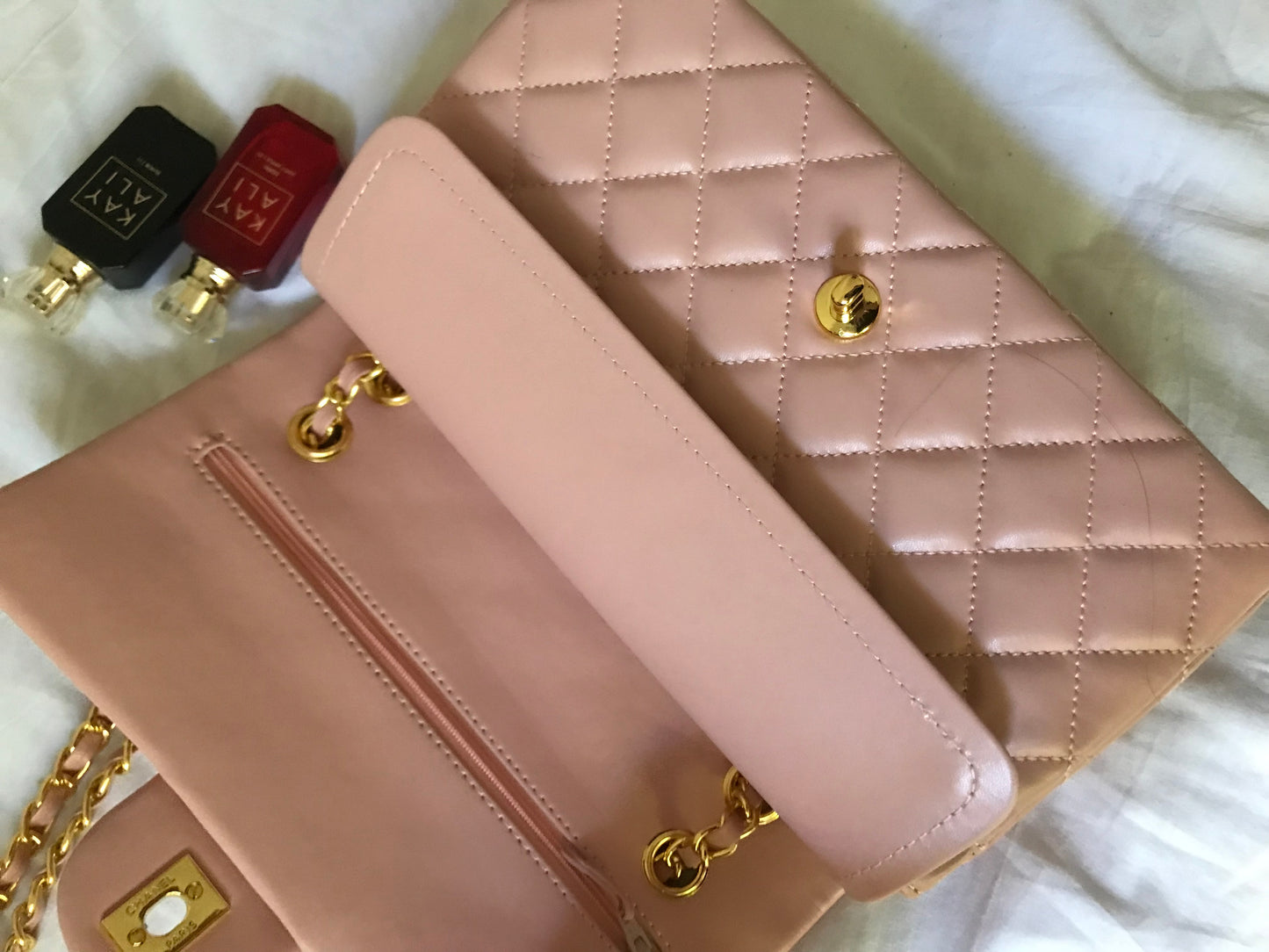 Pink quilted cross body bag