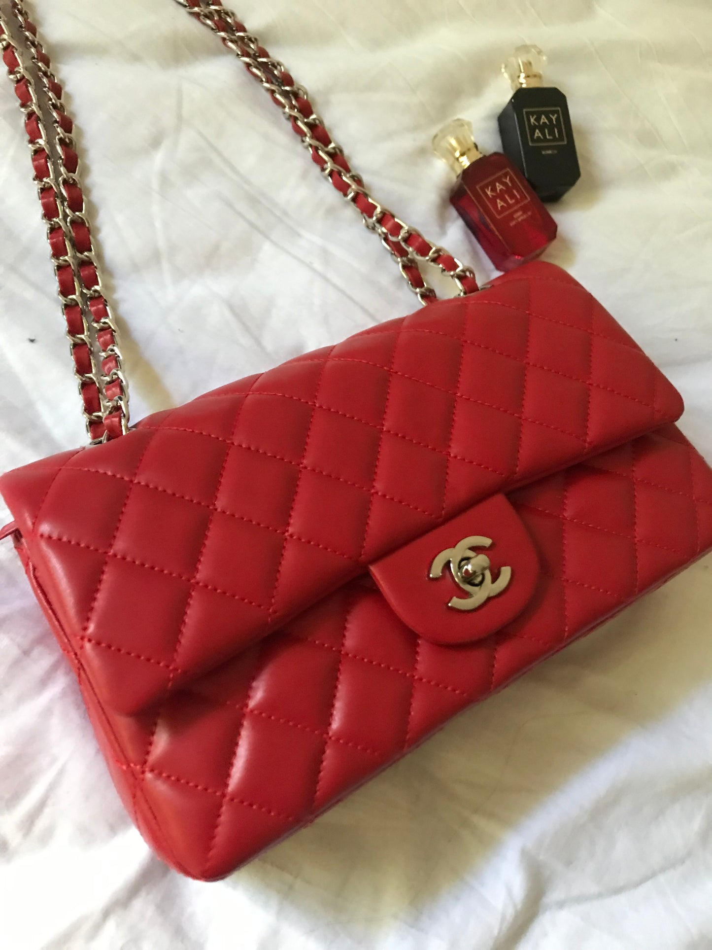 Red quilted cross body bag