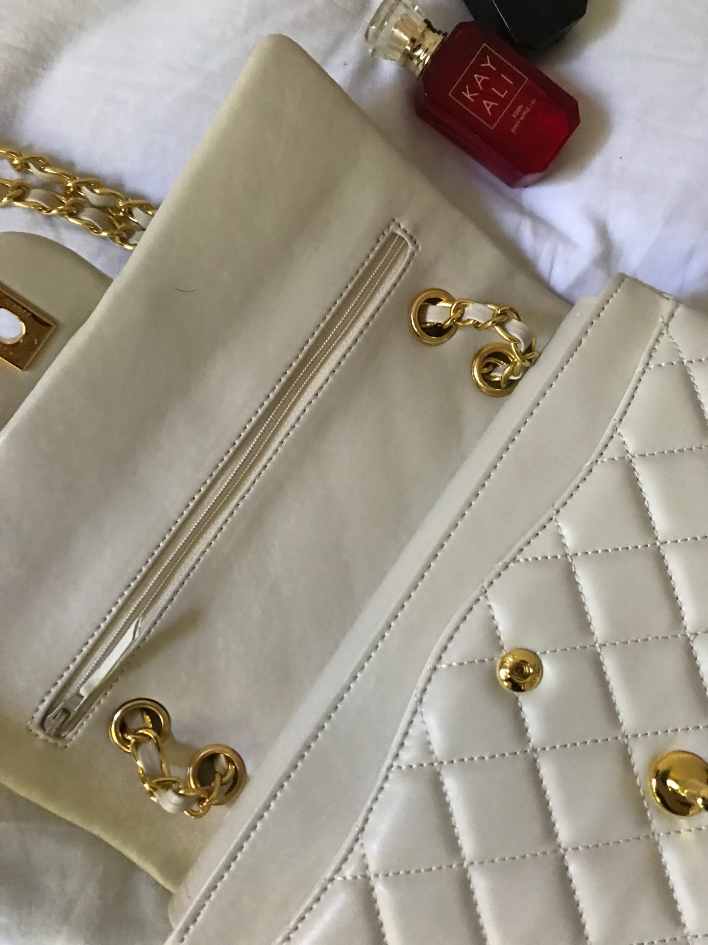 Beige quilted cross body bag