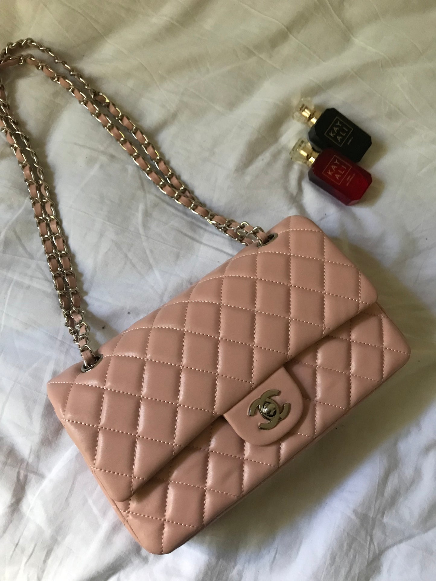 Pink quilted cross body bag