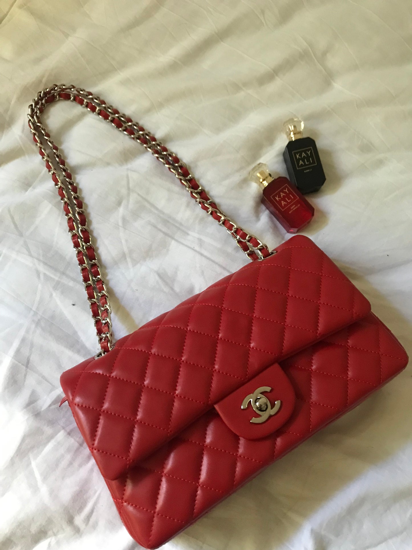 Red quilted cross body bag